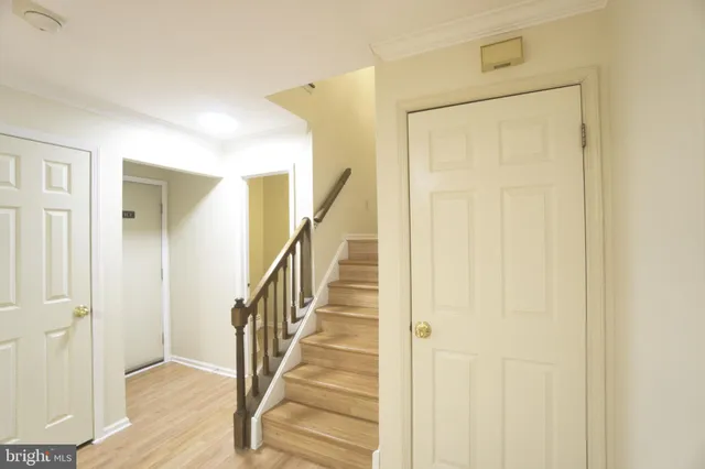 a view of entryway with wooden floor