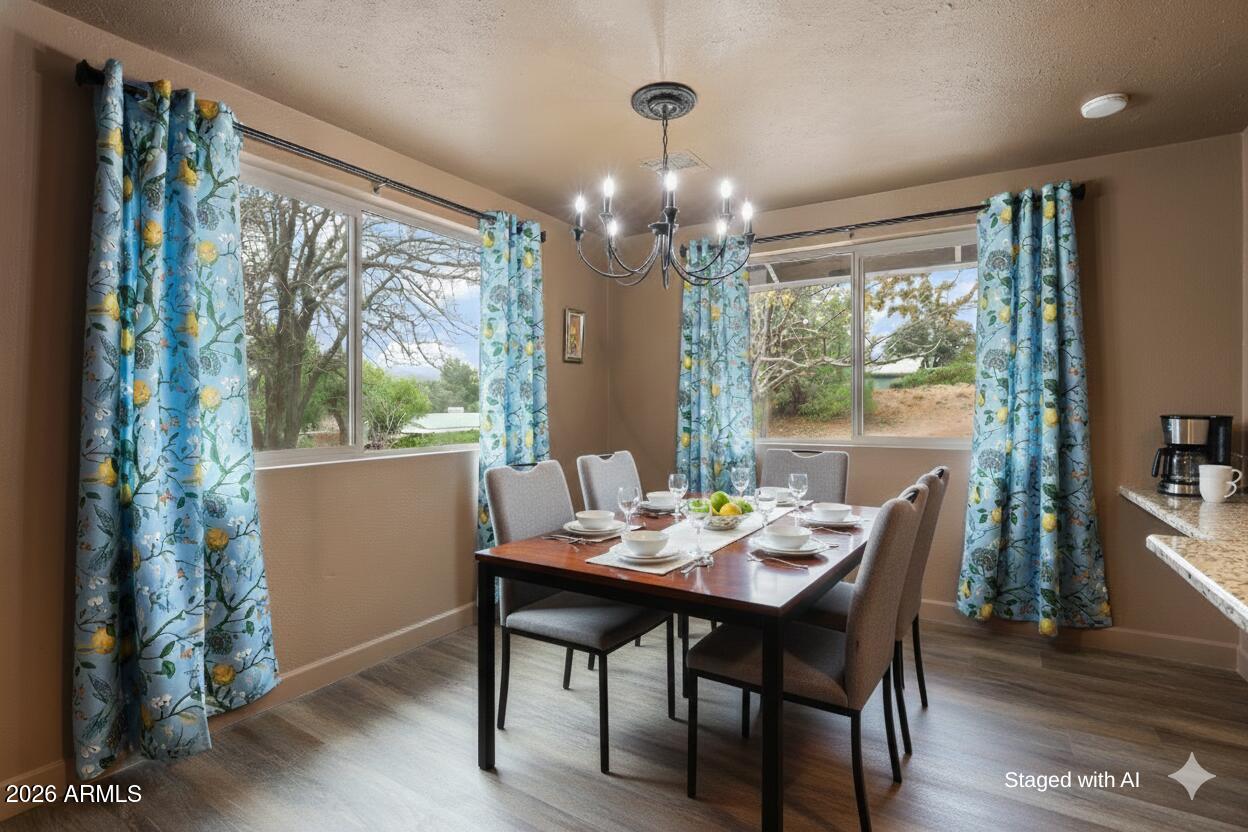 404 West Frontier Street Payson, AZ 85541 - Photo 13 of 39 a view of a dining room with furniture window and wooden floor