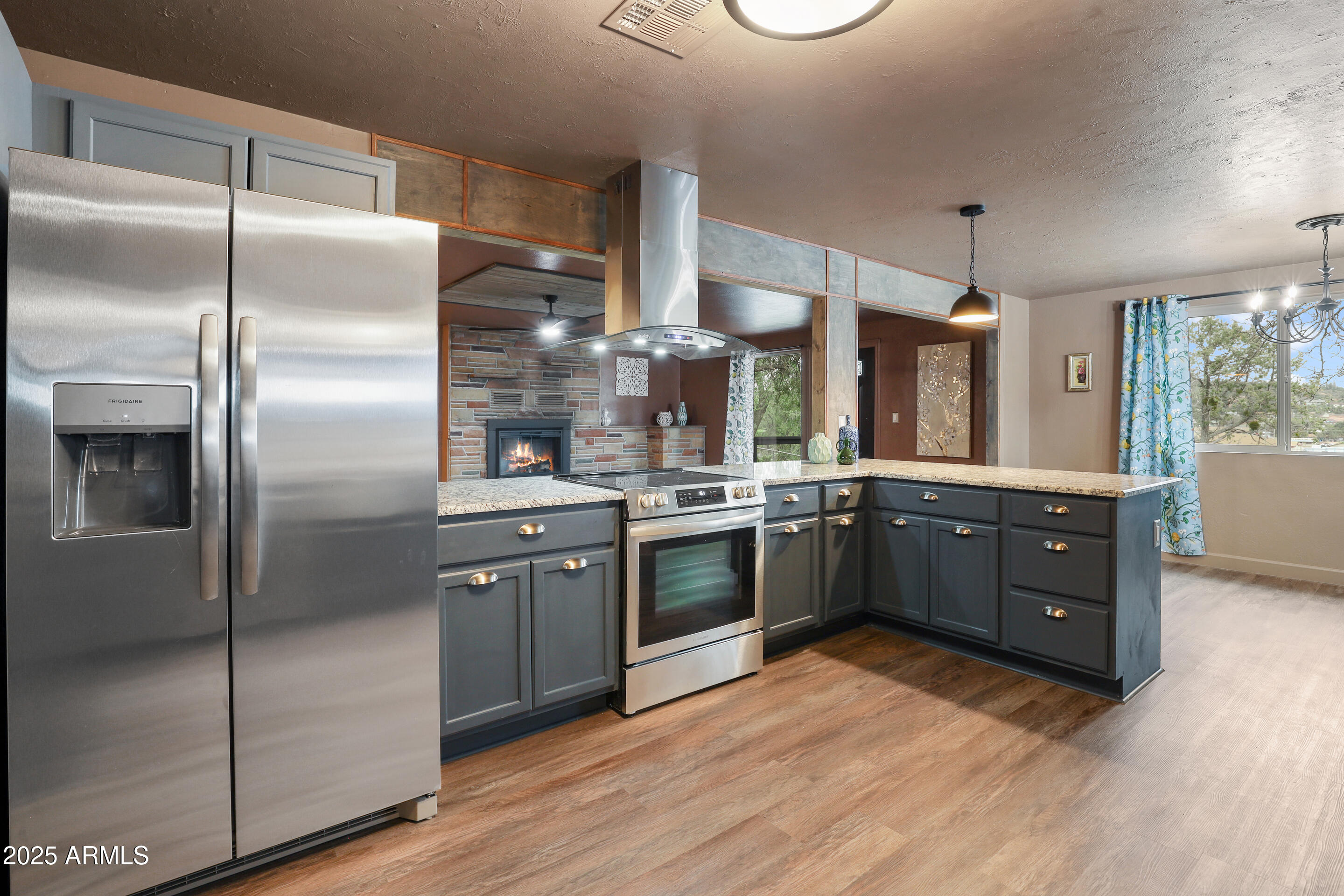 404 West Frontier Street Payson, AZ 85541 - Photo 16 of 39 a kitchen with stainless steel appliances granite countertop a refrigerator a sink a stove and oven