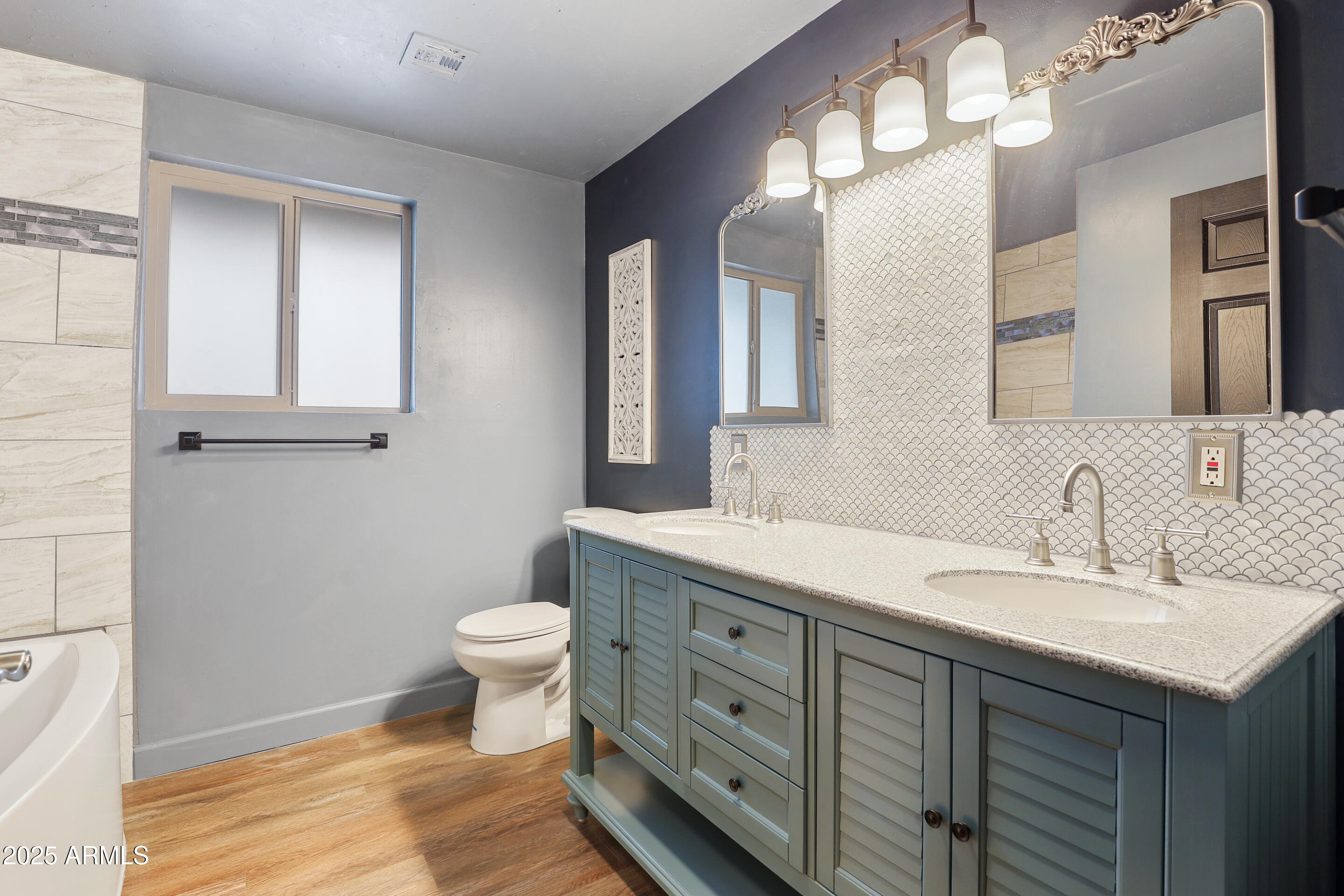 404 West Frontier Street Payson, AZ 85541 - Photo 24 of 39 a bathroom with a toilet sink and mirror