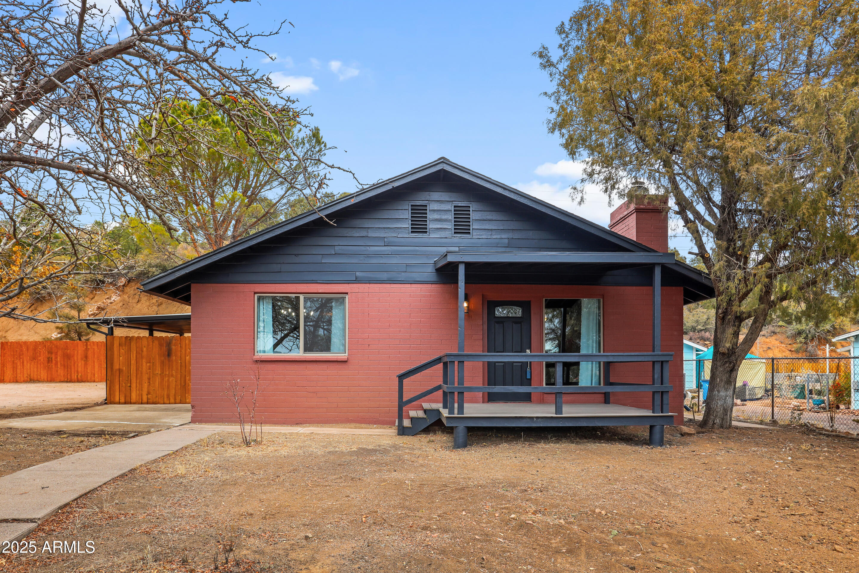 404 West Frontier Street Payson, AZ 85541 - Photo 3 of 39 a front view of a house with yard