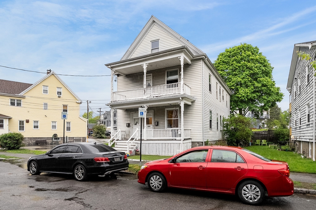 15 Guild Street Quincy, MA 02169 - Photo 7 of 42 a front view of a house with parking space