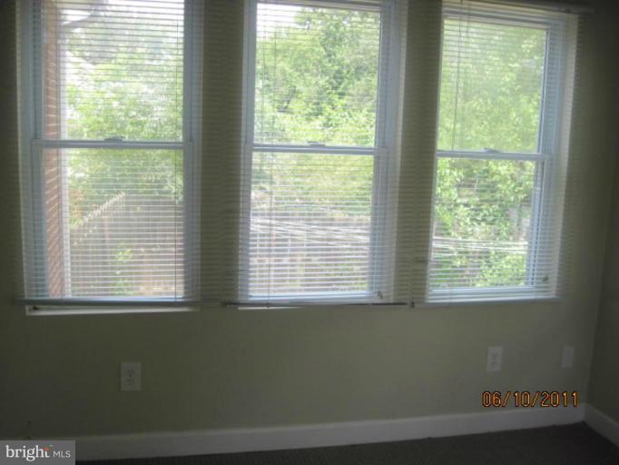 6013 Brunswick Street Springfield, VA 22150 - Photo 12 of 18 a view of an empty room with a window