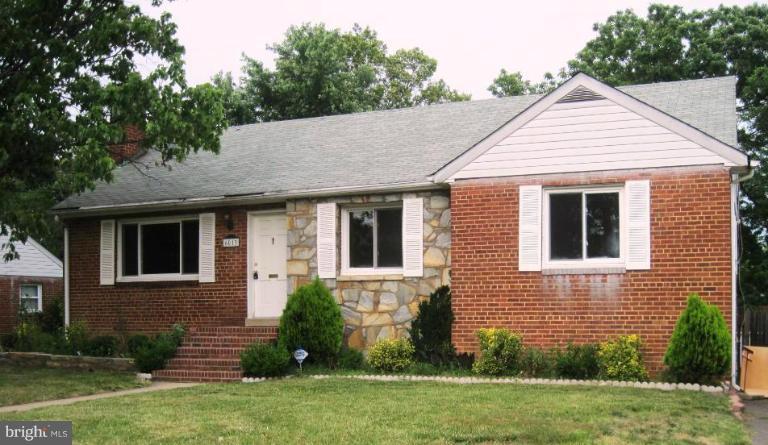6013 Brunswick Street Springfield, VA 22150 - Photo 7 of 18 a view of a house with a yard and plants