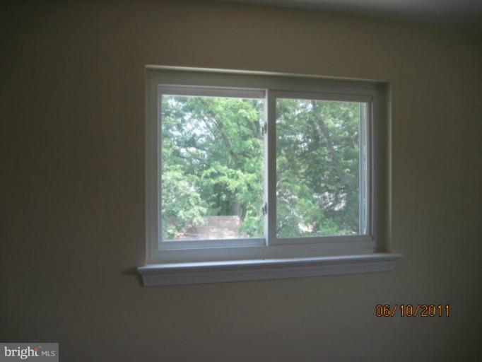 6013 Brunswick Street Springfield, VA 22150 - Photo 10 of 18 a view of a room that has a window in it