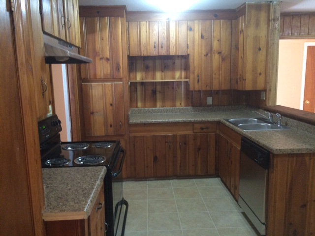 1720 Upper River Road, Unit 2 Macon, GA 31211 - Photo 6 of 8 a kitchen with a sink stove and cabinets