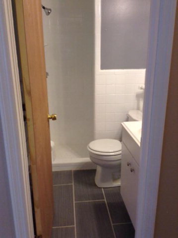 1720 Upper River Road, Unit 2 Macon, GA 31211 - Photo 7 of 8 a bathroom with a toilet and a shower