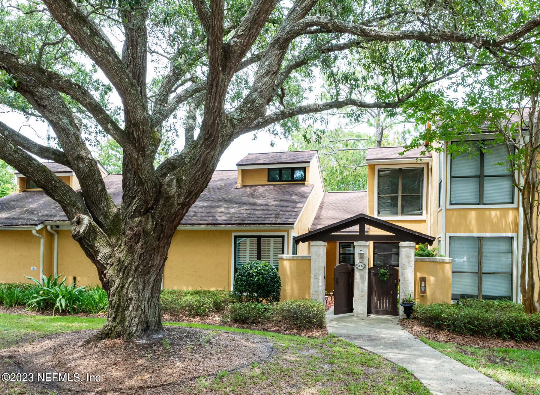 746 Tidewater Court Ponte Vedra Beach, FL 32082 - Photo 1 of 33 a front view of a house with a yard