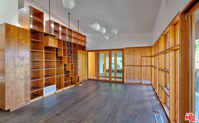 a view of a balcony with chairs