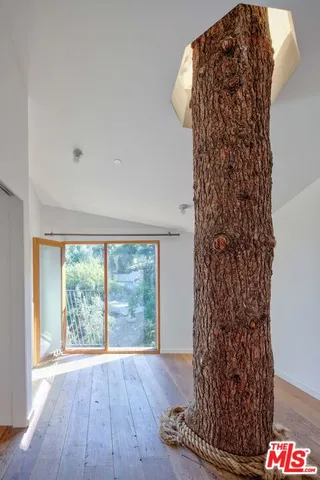 a view of balcony with wooden floor