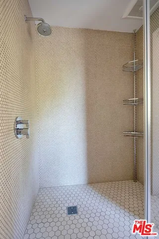 a big room with closet and windows