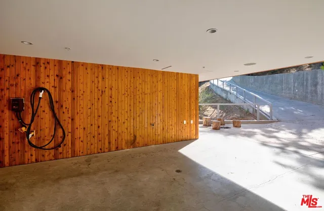 a view of bedroom with wooden floor