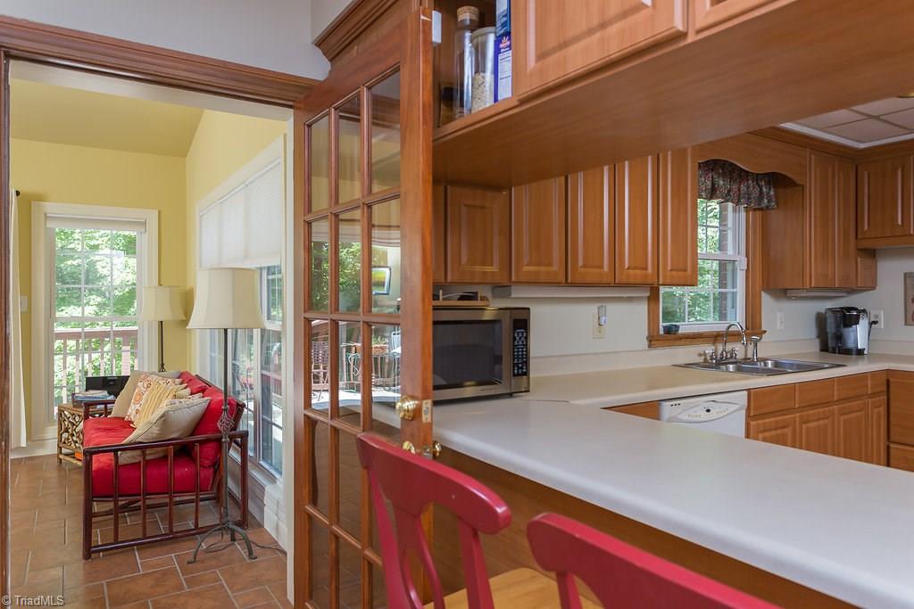 2206 Red Forest Road Greensboro, NC 27410 - Photo 14 of 30 Enter sunroom off breakfast area