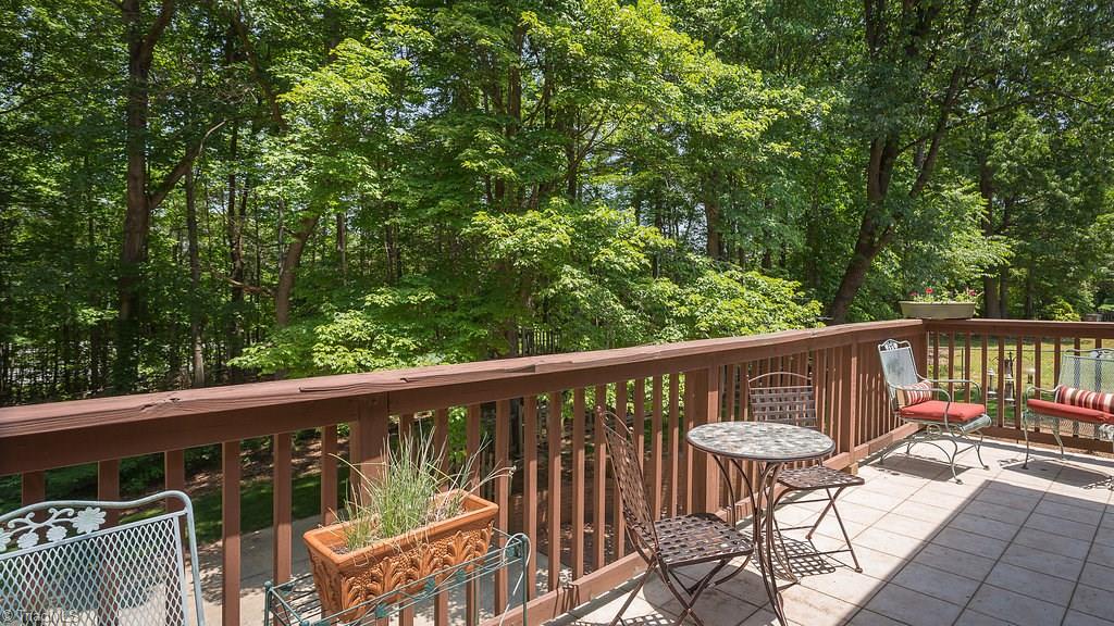 2206 Red Forest Road Greensboro, NC 27410 - Photo 6 of 30 Walk out from the sunroom onto the large deck