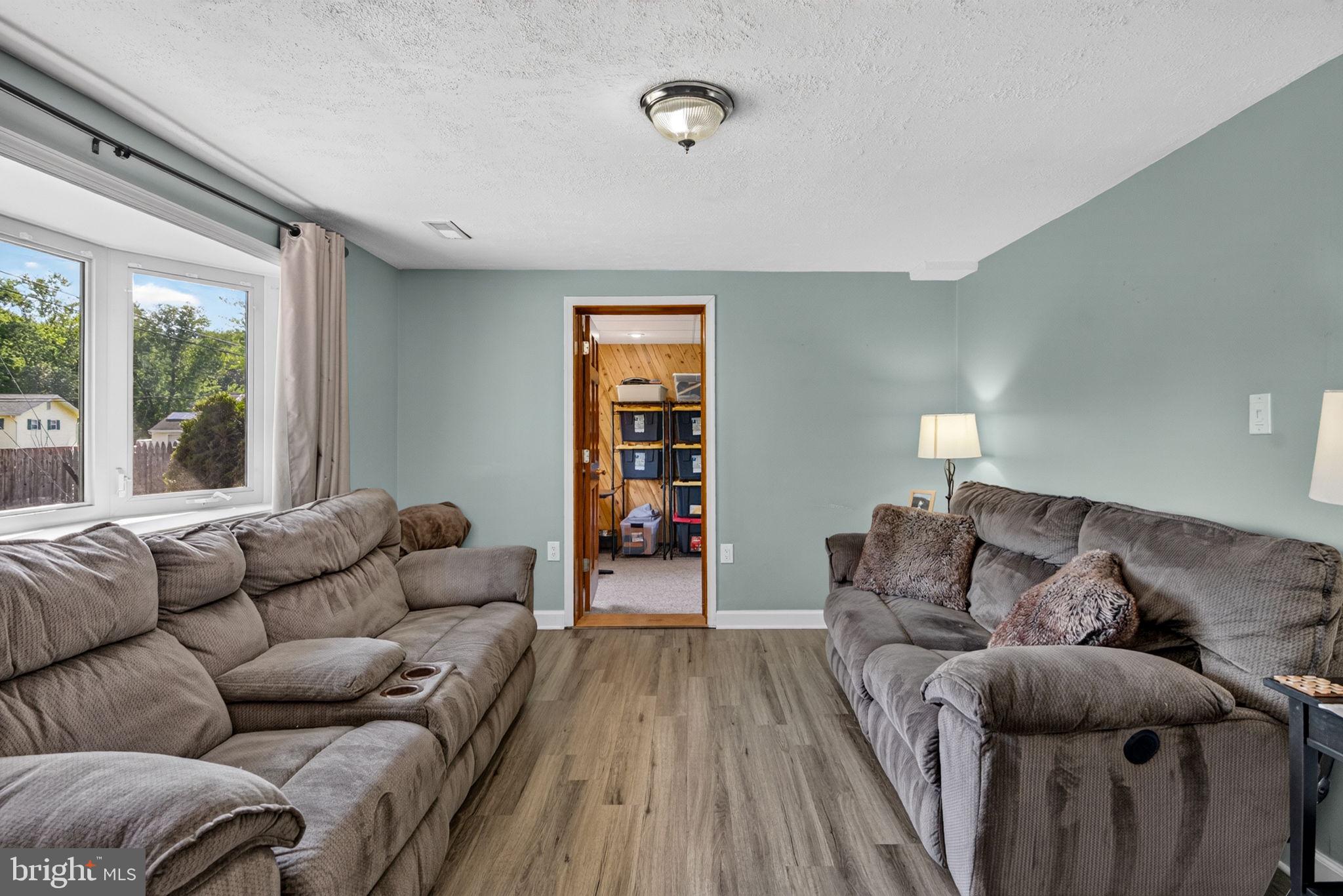 12 Woodbridge Road Gibbsboro, NJ 08026 - Photo 6 of 45 a living room with furniture and a window