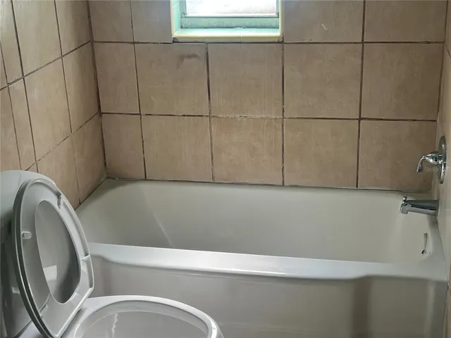 a bathroom with a bathtub