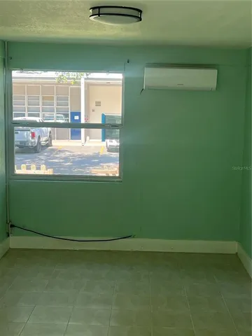 a view of a small space with a window