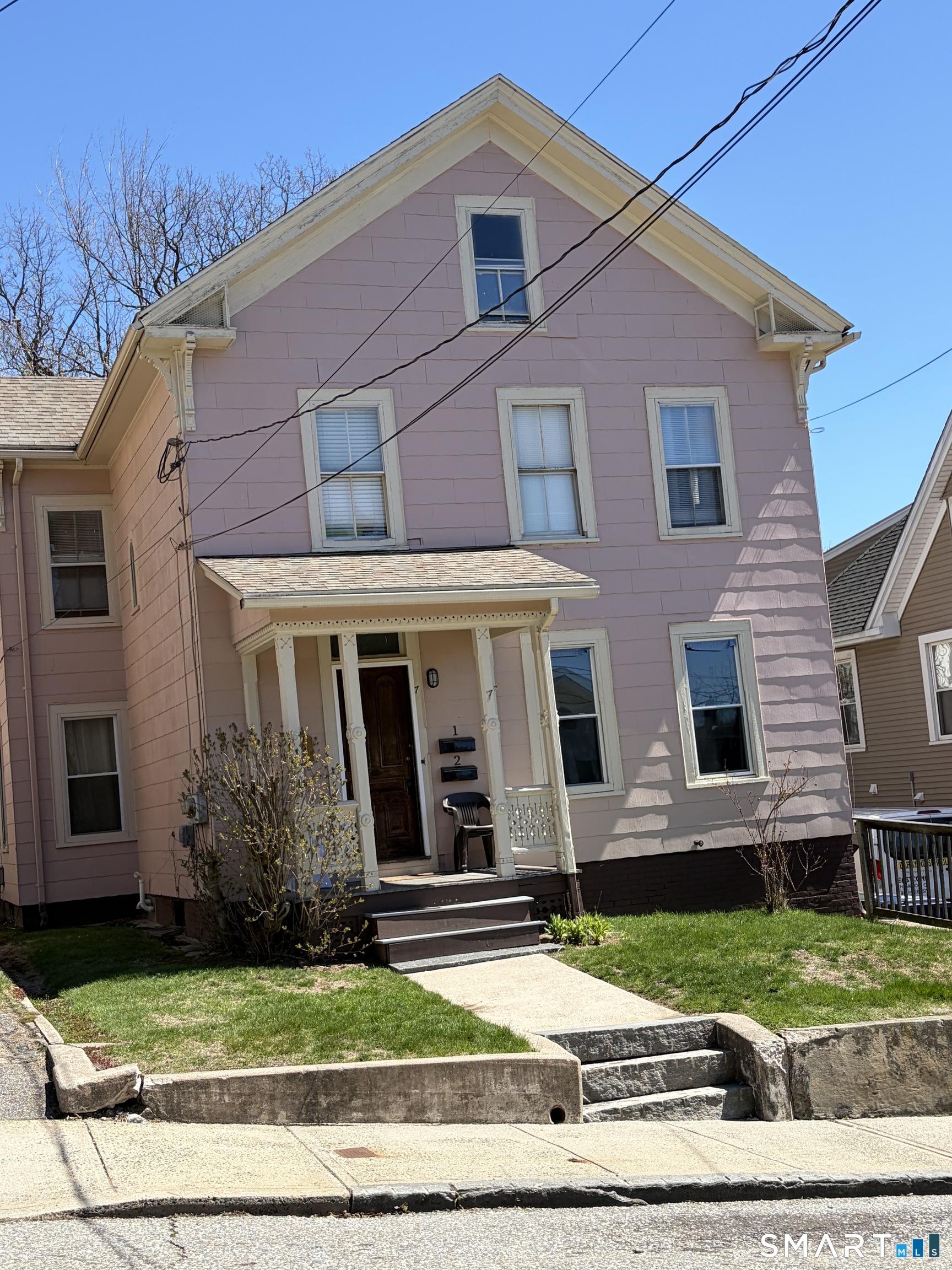 7 Turner Street Windham, CT 06226 - Photo 11 of 21 a front view of a house with garden