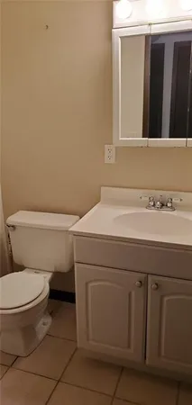 a bathroom with a sink and a toilet