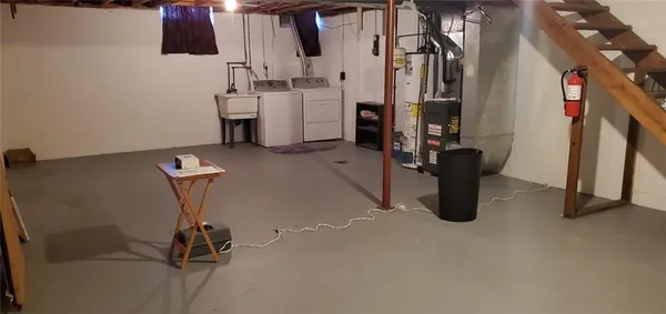 a view of a storage & utility room with stuff