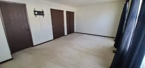 a view of hallway with rug