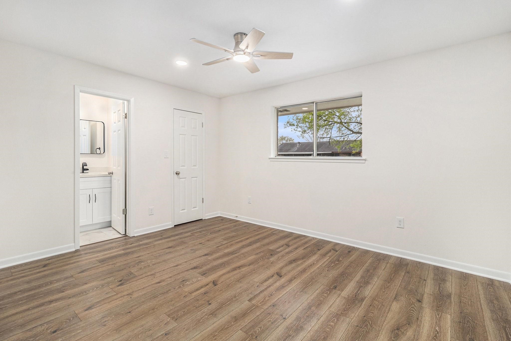 1510 Tarberry Road Houston, TX 77088 - Photo 11 of 19 wooden floor in an empty room