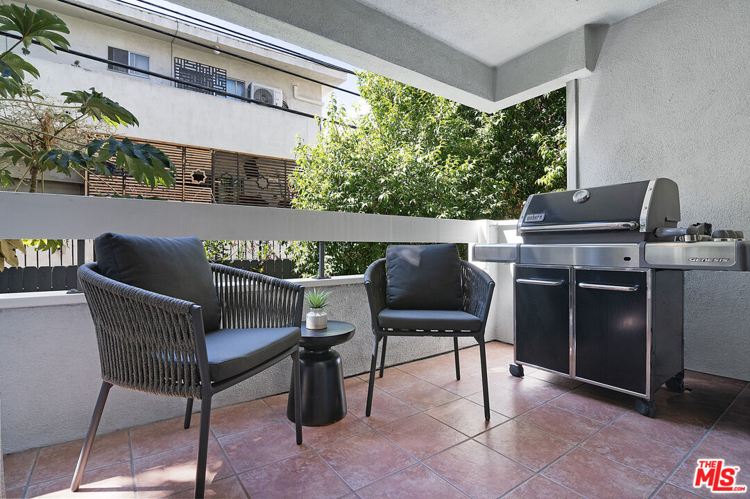 1887 Greenfield Avenue, Unit 110 Los Angeles, CA 90025 - Photo 16 of 18 a outdoor living space with furniture
