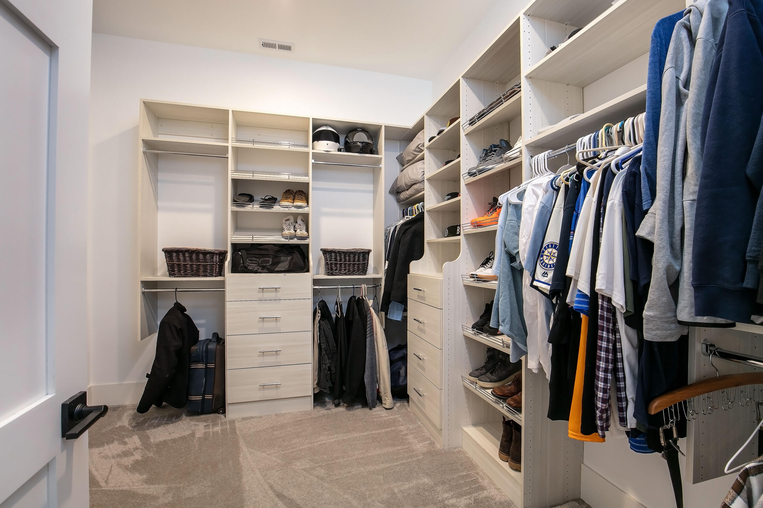 19550 Buck Canyon Road Bend, OR 97702 - Photo 13 of 28 a view of walk in closet with clothes and shoes
