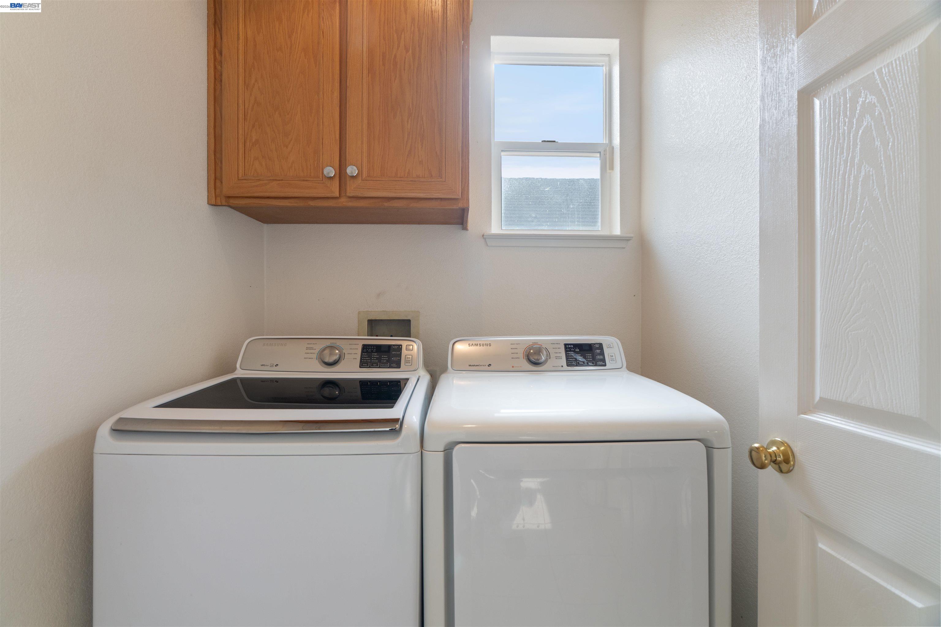4925 Bay View Circle Stockton, CA 95219 - Photo 13 of 47 a utility room with dryer and washer
