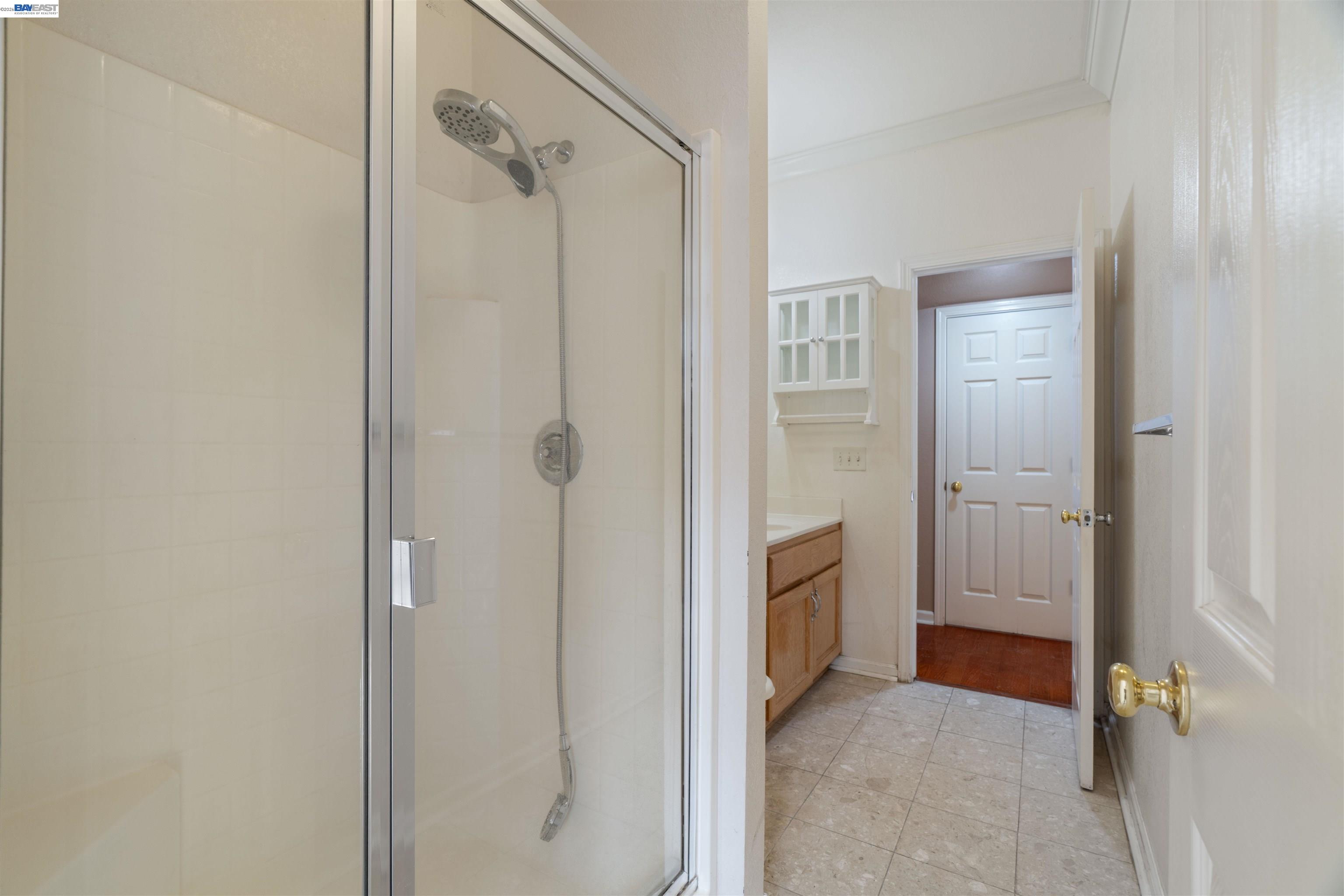 4925 Bay View Circle Stockton, CA 95219 - Photo 16 of 47 a bathroom with a shower and a sink