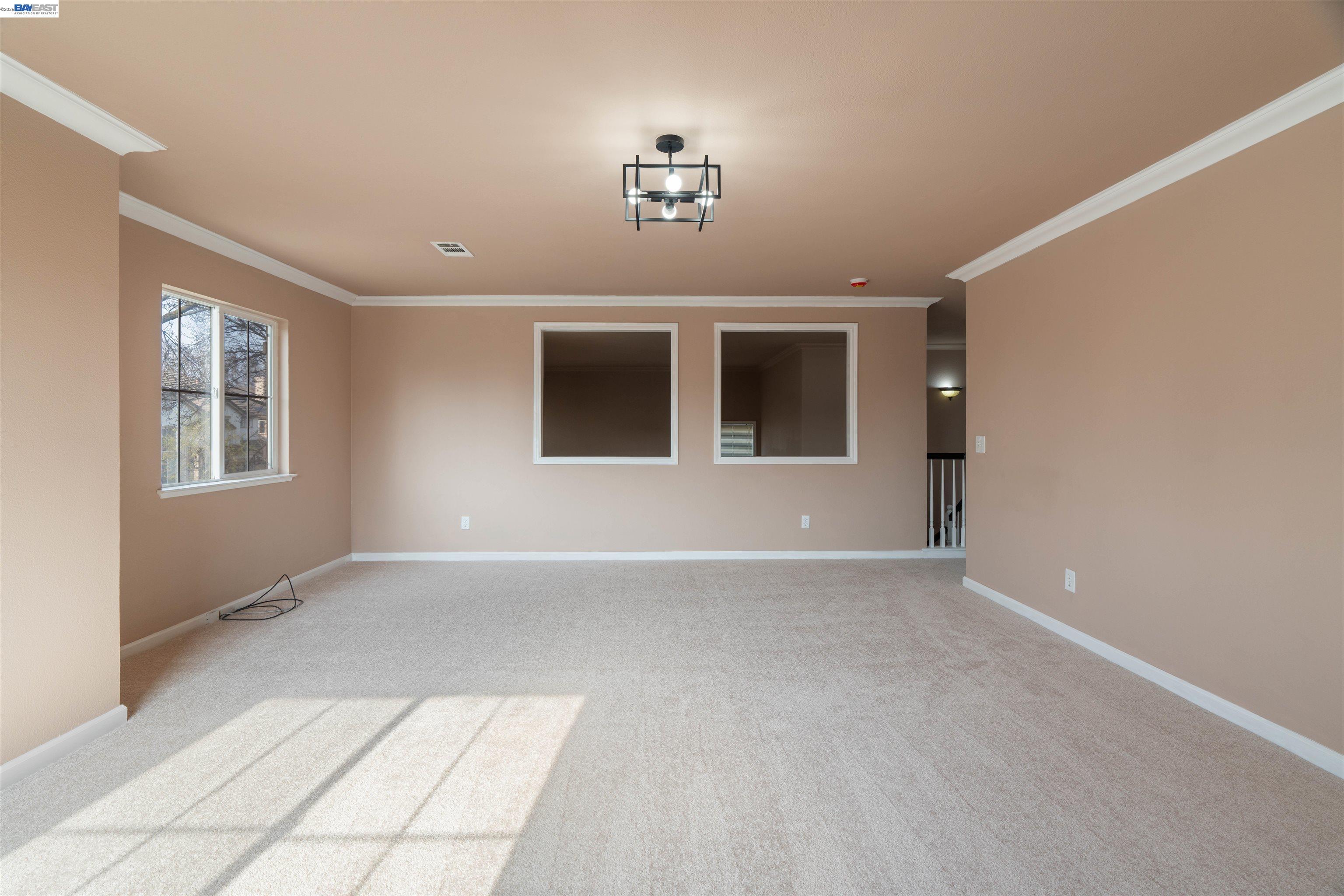 4925 Bay View Circle Stockton, CA 95219 - Photo 19 of 47 a view of an empty room with a window
