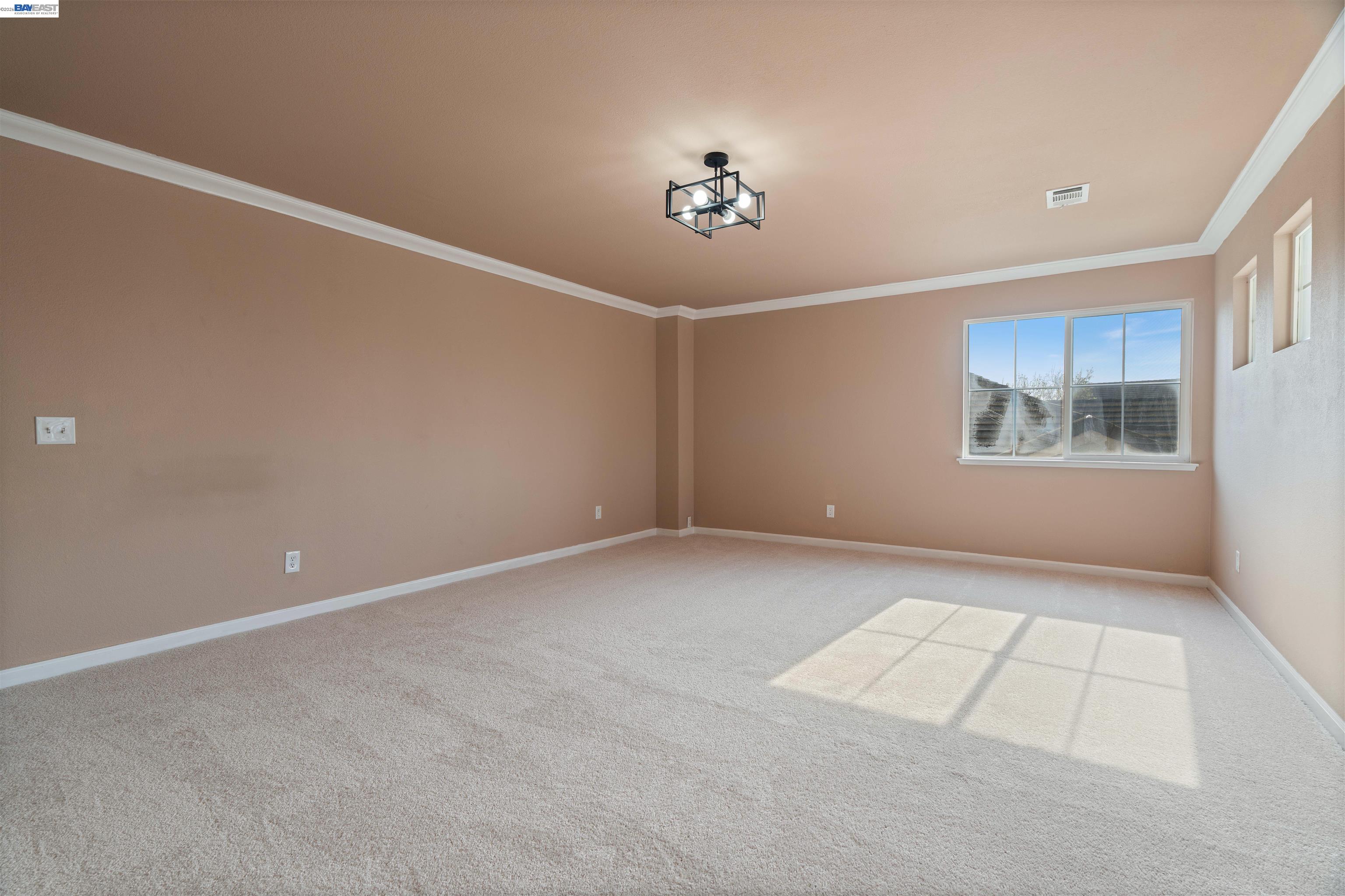 4925 Bay View Circle Stockton, CA 95219 - Photo 20 of 47 a view of an empty room with a window