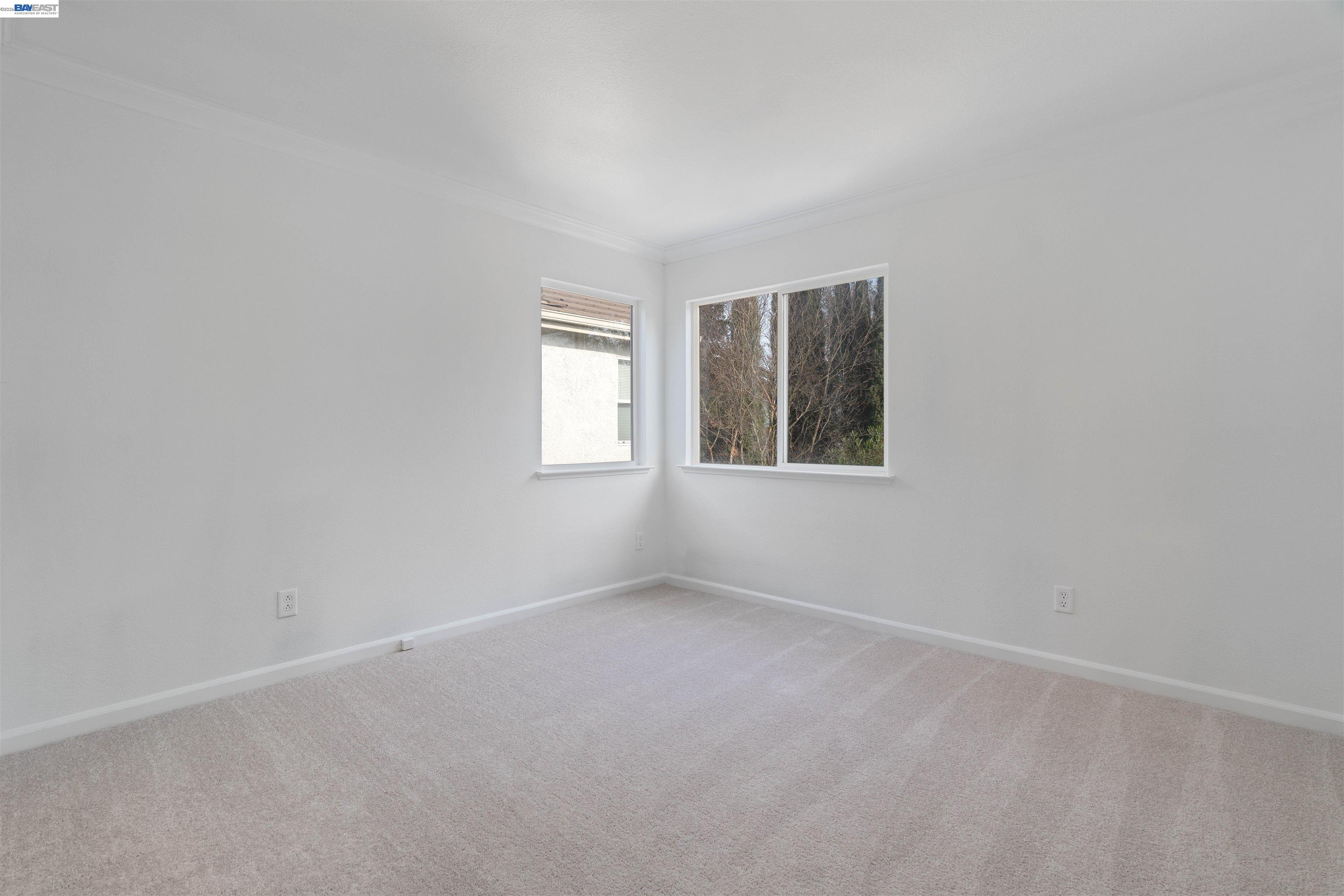 4925 Bay View Circle Stockton, CA 95219 - Photo 21 of 47 an empty room with windows