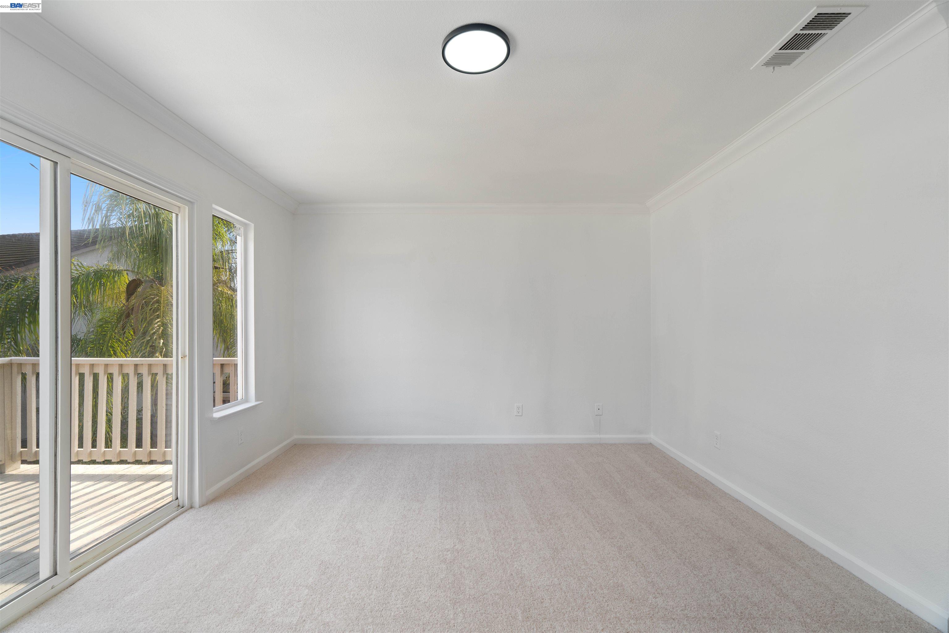 4925 Bay View Circle Stockton, CA 95219 - Photo 29 of 47 an empty room with a empty space and window