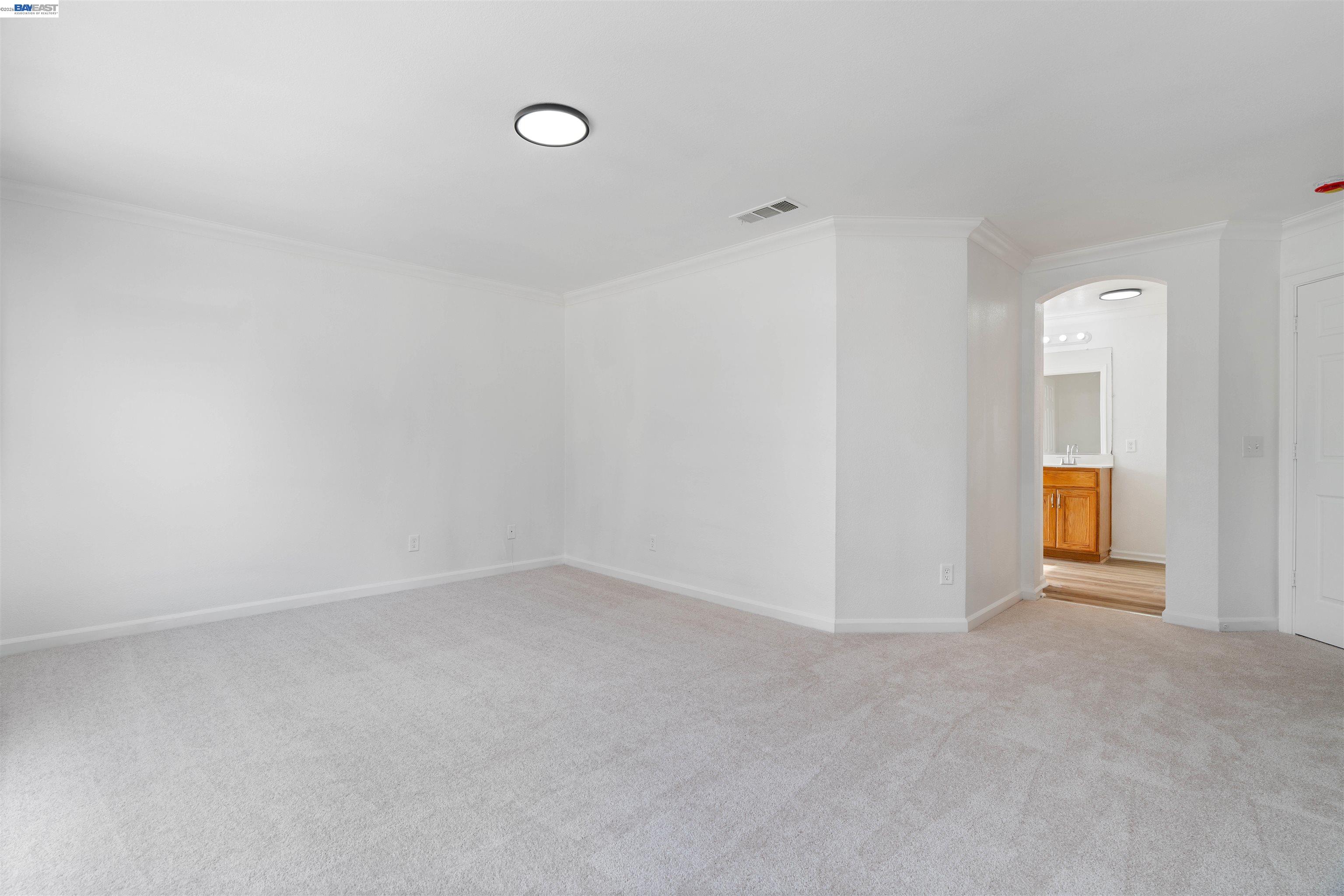 4925 Bay View Circle Stockton, CA 95219 - Photo 30 of 47 a view of an empty room with a window