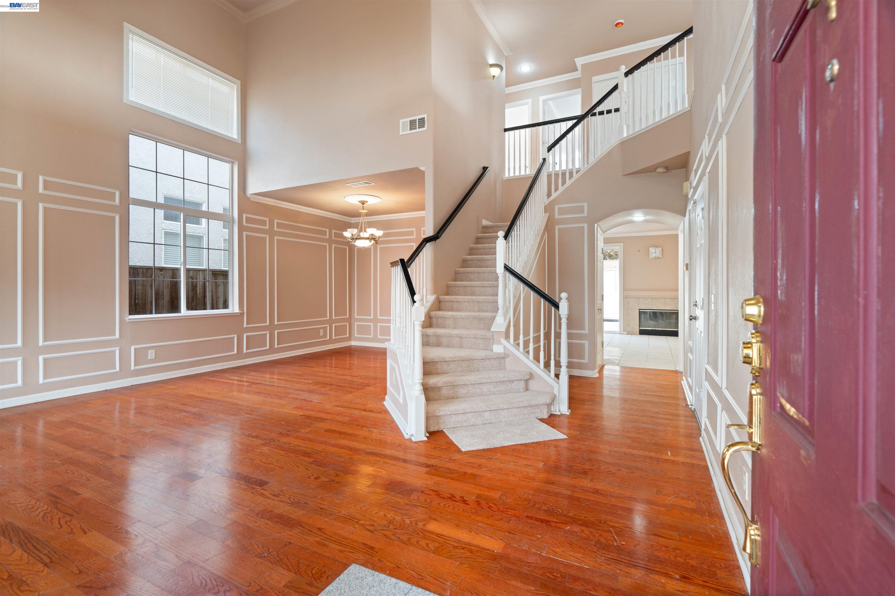4925 Bay View Circle Stockton, CA 95219 - Photo 3 of 47 a view of entryway and hall with wooden floor