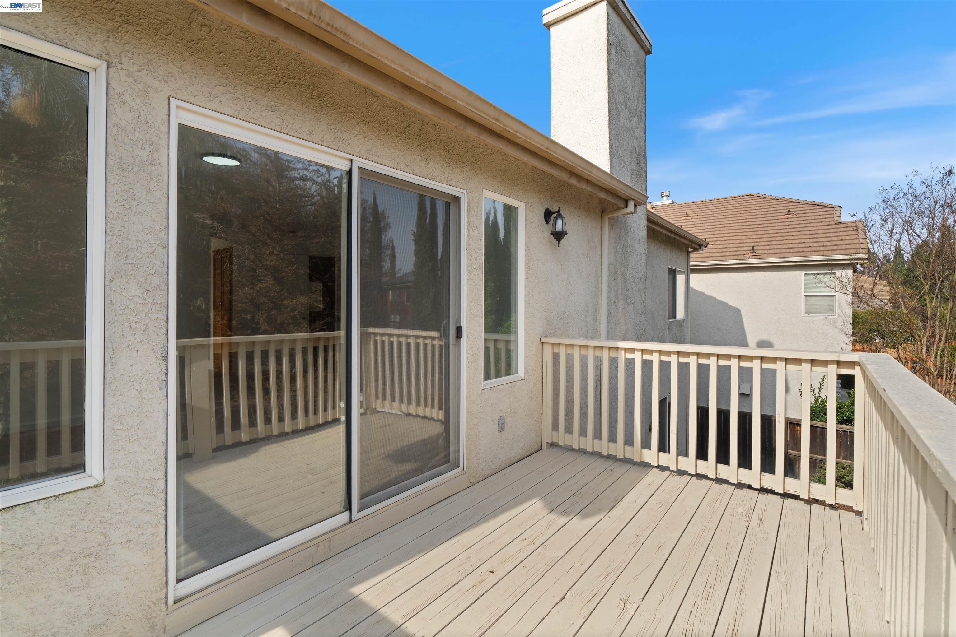 4925 Bay View Circle Stockton, CA 95219 - Photo 35 of 47 a view of a balcony with wooden floor
