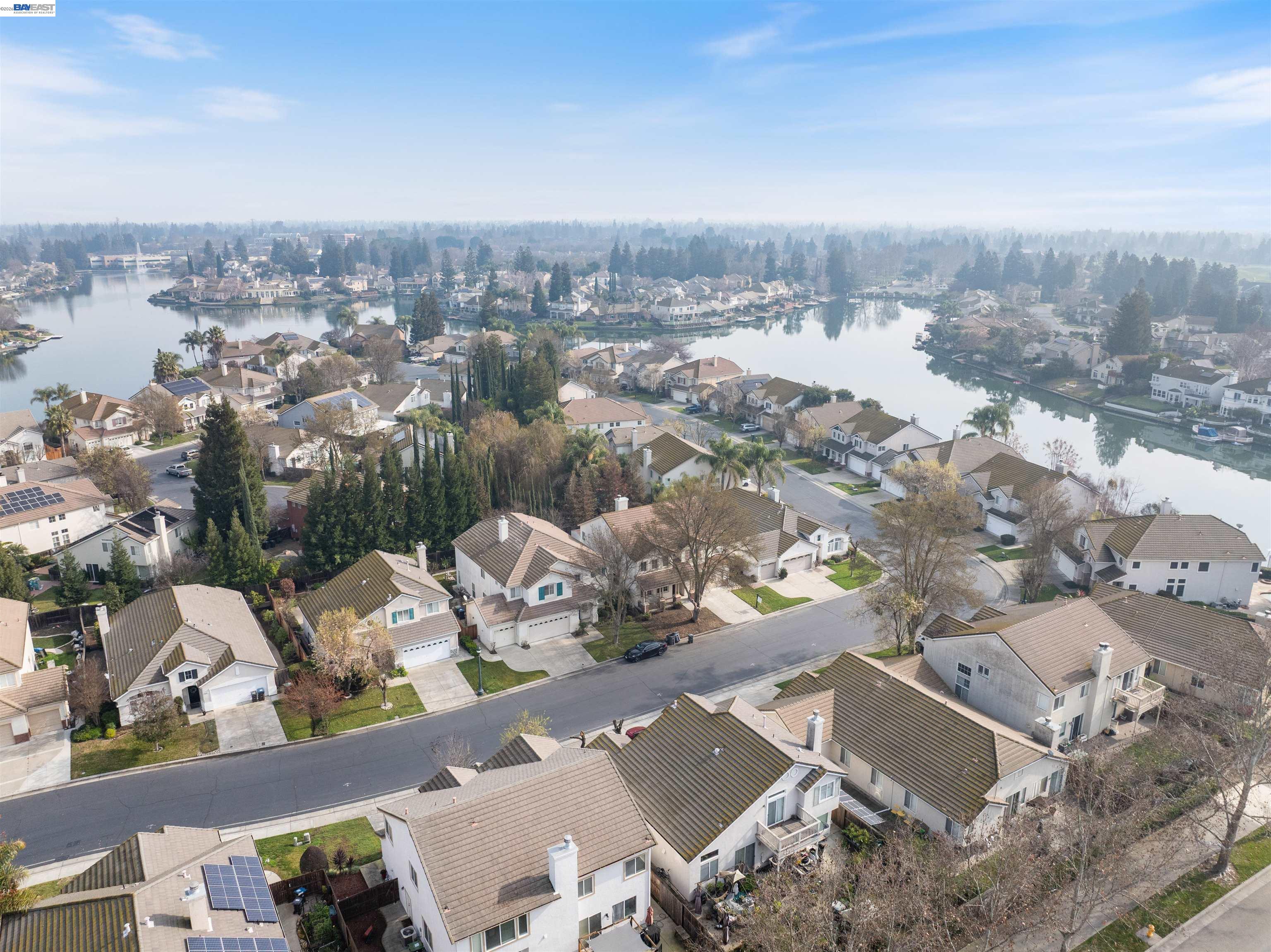 4925 Bay View Circle Stockton, CA 95219 - Photo 46 of 47 an aerial view of a house with a yard and ocean view
