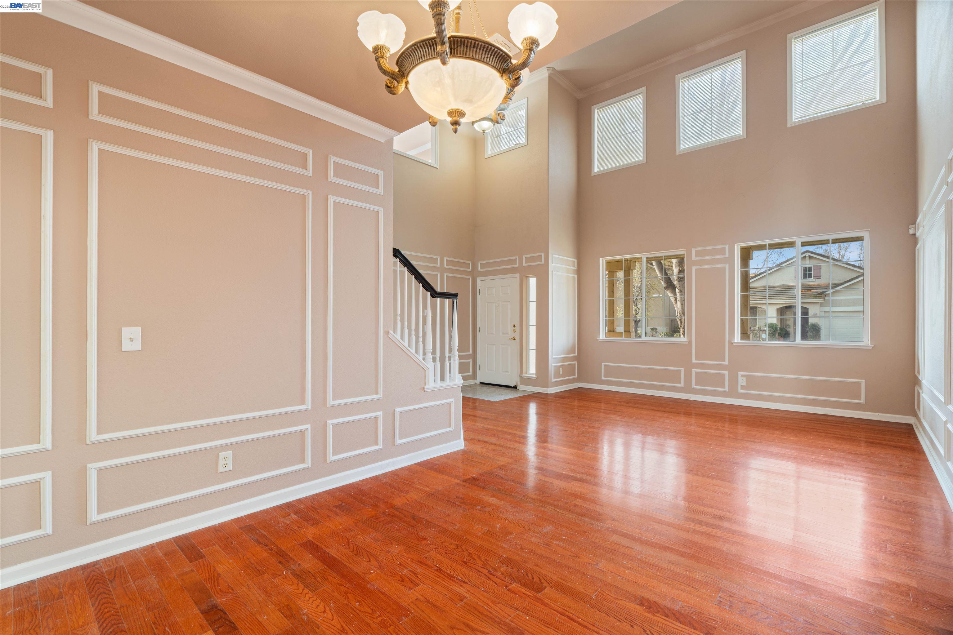 4925 Bay View Circle Stockton, CA 95219 - Photo 5 of 47 a view of livingroom with hardwood floor and window