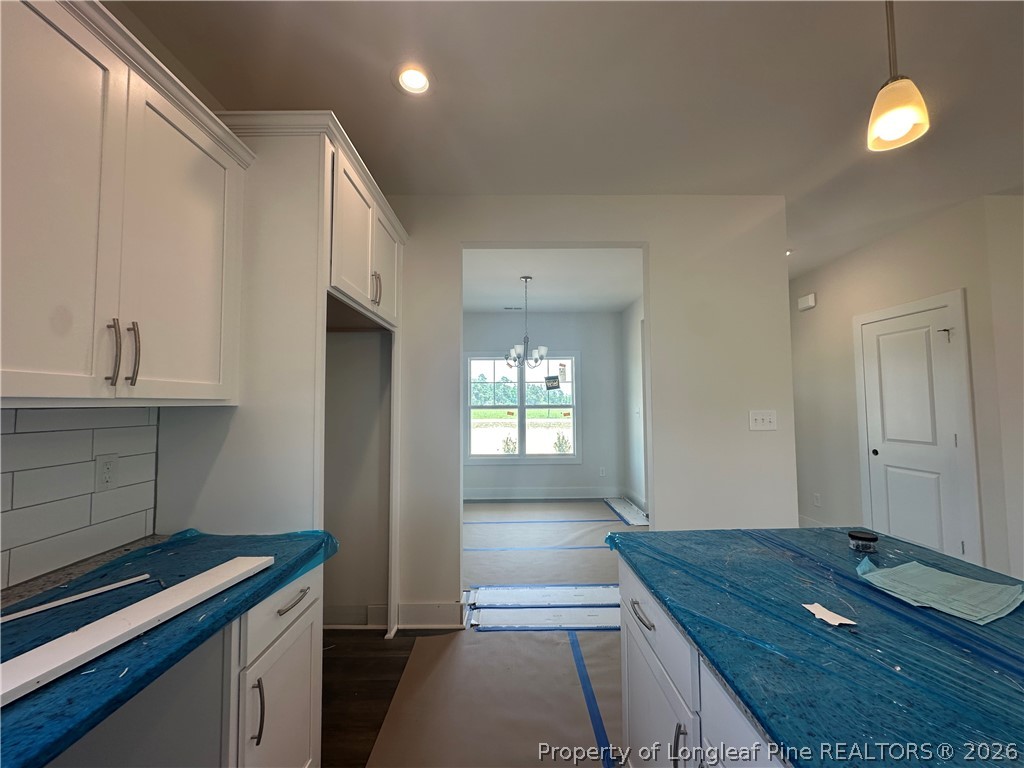 8383 Shannon Road Shannon, NC 28386 - Photo 6 of 17 a kitchen with a sink cabinets and appliances