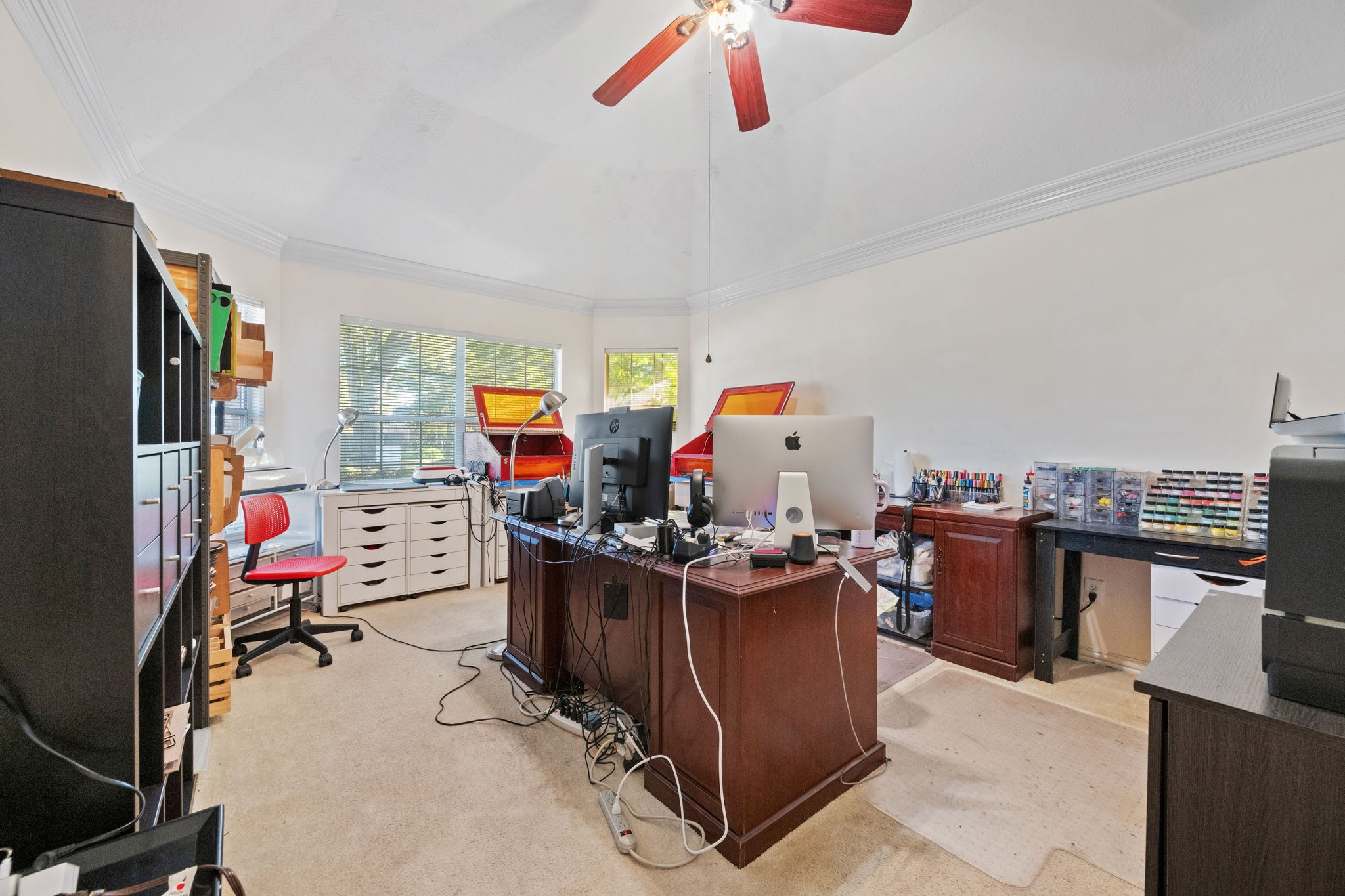 31419 Fountainbrook Park Lane Spring, TX 77386 - Photo 24 of 28 Office - the homeowner is an Etsy shop owner so please excuse the look - it's her busy season. This is a huge room. Would make a great playroom, homeschool room, or an office large enough for two desks.