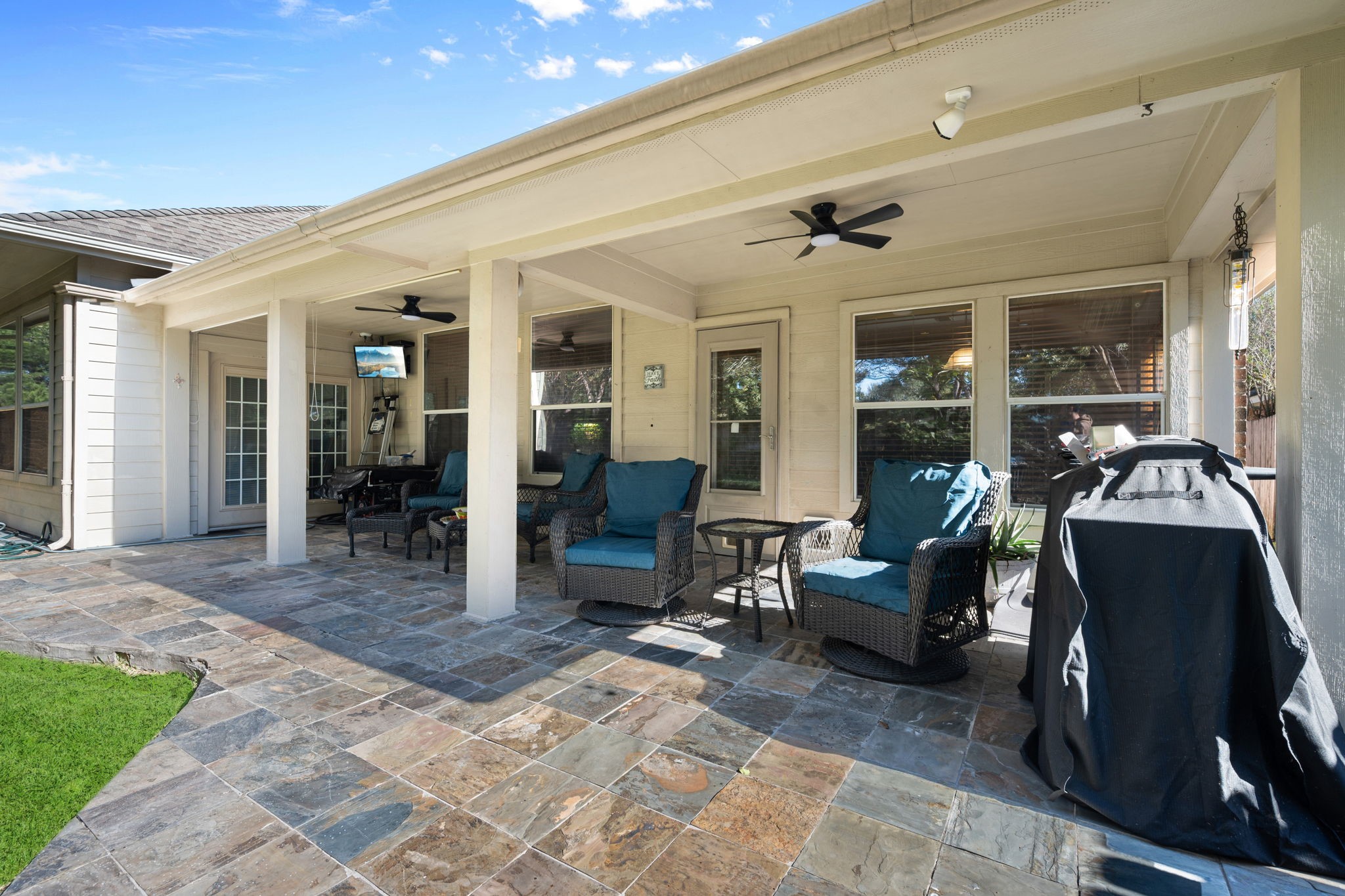 31419 Fountainbrook Park Lane Spring, TX 77386 - Photo 25 of 28 This spacious patio features tile flooring, 2 ceiling fans, room for seating, a grill, whole house generator.