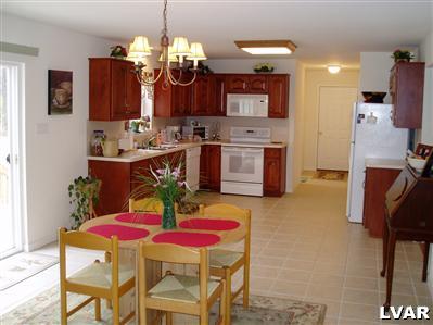 1 Long Mt Road Effort, PA 18330 - Photo 2 of 6 a view of a dining room with furniture and chandelier