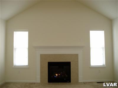 1 Long Mt Road Effort, PA 18330 - Photo 3 of 6 a living room with a fireplace and a window