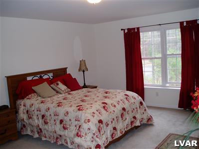 1 Long Mt Road Effort, PA 18330 - Photo 6 of 6 a bedroom with a bed and window