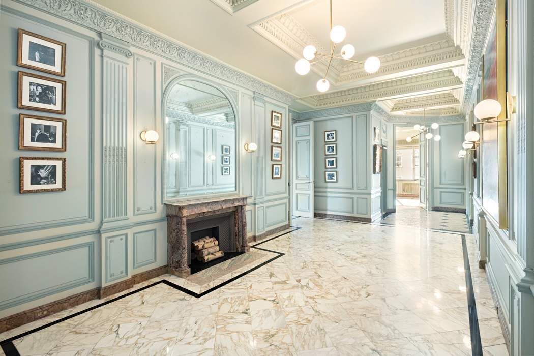 910 5th Avenue, Unit 11BC Manhattan, NY 10021 - Photo 5 of 18 a view of an entryway with a fireplace