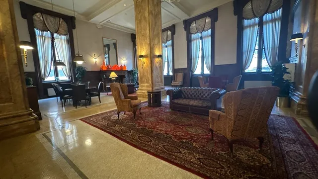 a view of a living room and dining room