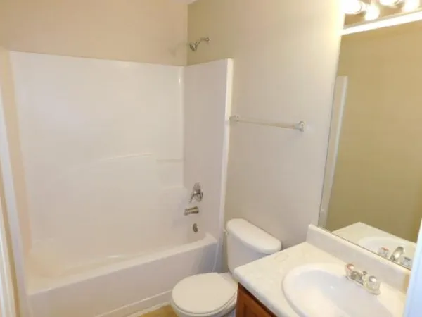 a bathroom with a toilet and sink