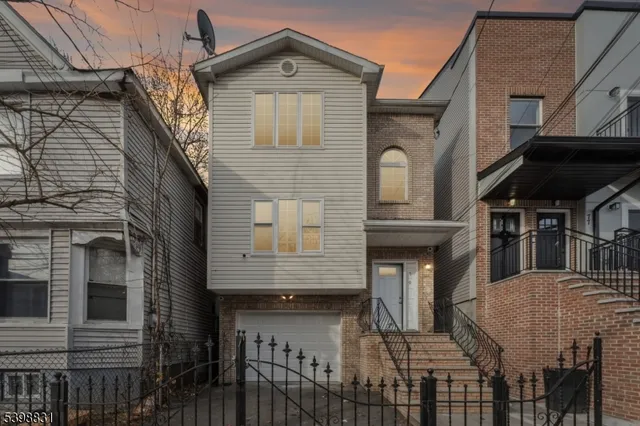 a front view of a house with a door