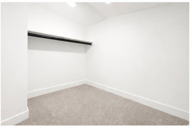 266 700 West Provo, UT 84601 - Photo 16 of 18 Walk in closet with carpet floors and vaulted ceiling